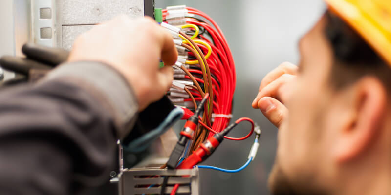 Electrician Testing Wires